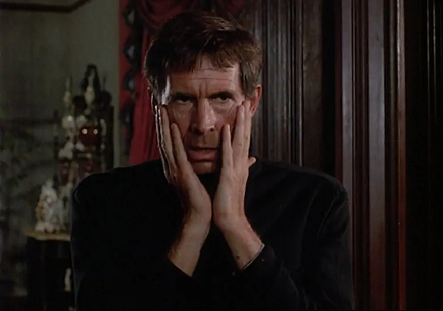 Norman Bates, holding his hands to his face: Psycho II