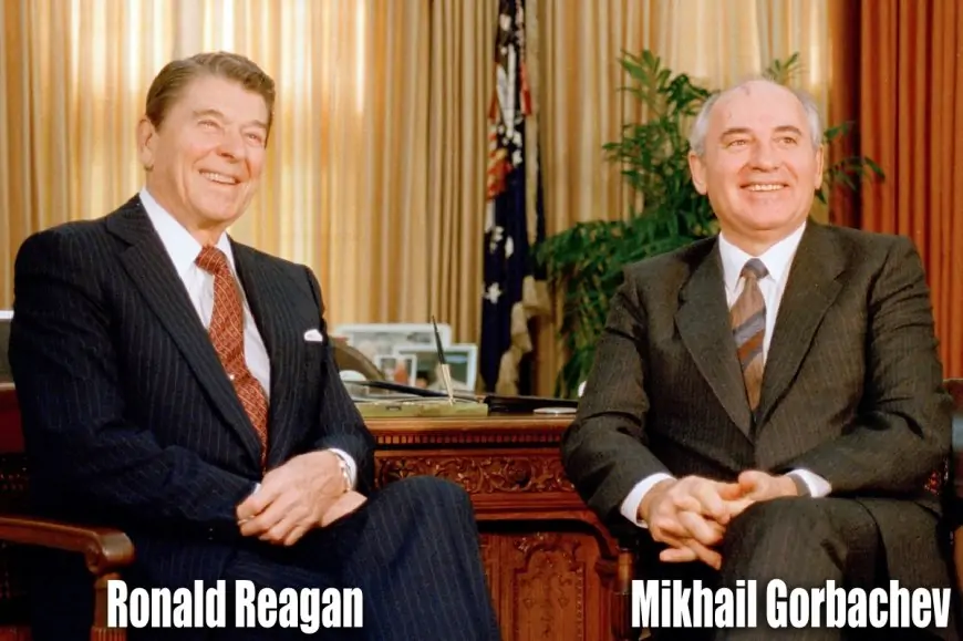 Ronald Reagan sitting with Mikhail Gorbachev in the 1980s
