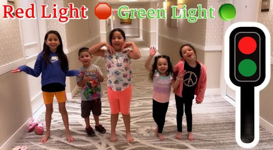 Children playing RED LIGHT, GREEN LIGHT