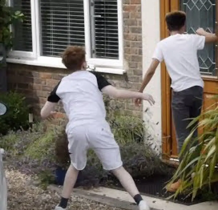 2 boy playing Robbers Knock